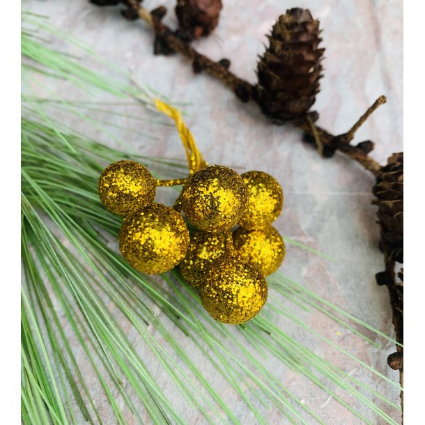 Dekorationsmateriale pinde med guld glitter kugler